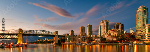 Panorama view Granville island near Burrard Street Bridge at twilight in Vancouver,Canada photo