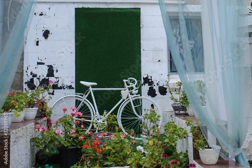 White bicycle in vintage old zone photo