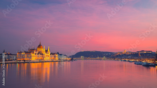 Budapest, Hungary. Panoramic cityscape image of Budapest, capital city of Hungary with Hungarian Parliament Building during beautiful sunset.