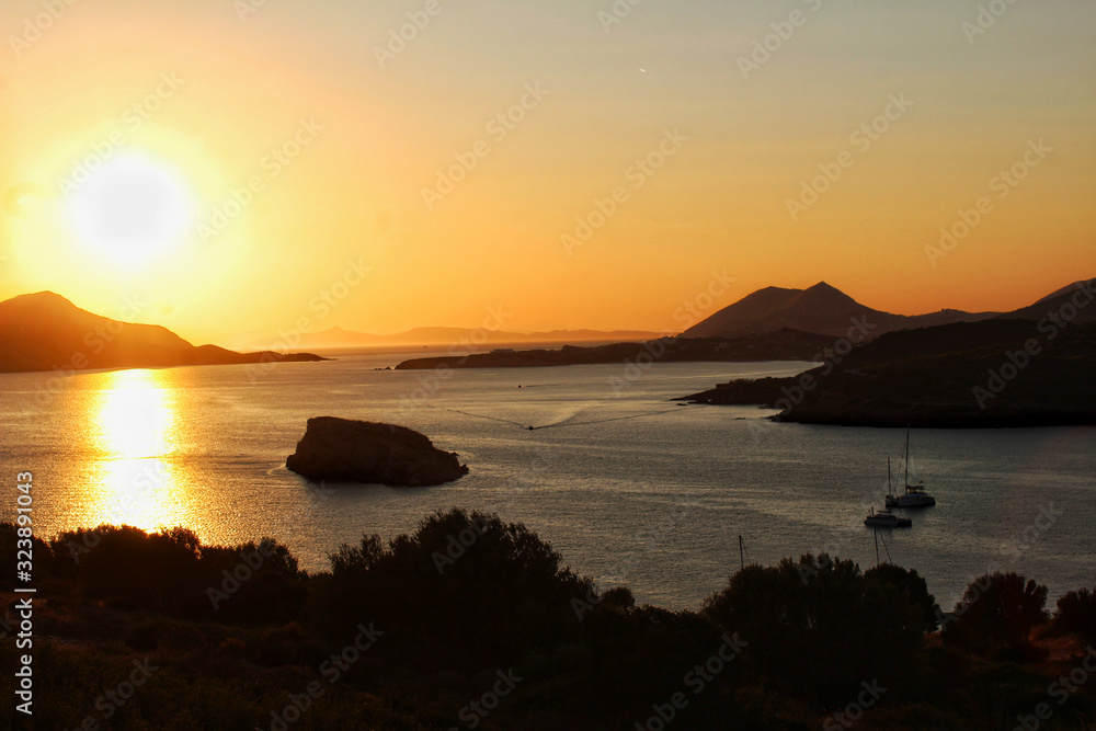 sunset on coast of sea greece