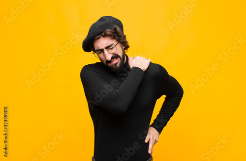 Foto young french artist man feeling tired, stressed, anxious, frustrated and depress