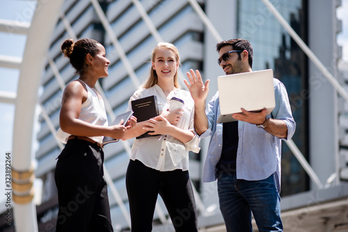 Businessman feelancer or engineer in casual stand in the city and talk together. Business engineering concept. photo