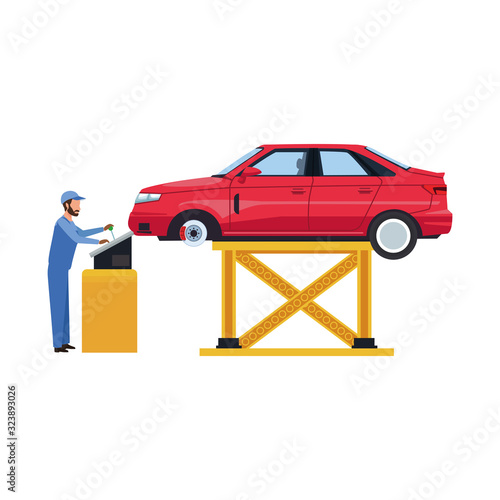 man supervising a lifted car