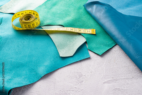 Pieces of genuine leather in different colors are used for sewing accessories.