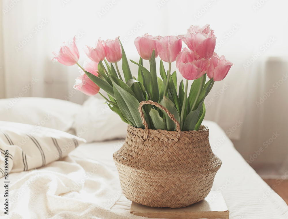 tulips in a basket at home on the sofa tulips in a basket at home on the sofa