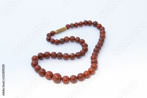 Brown jasper beads isolated on white background