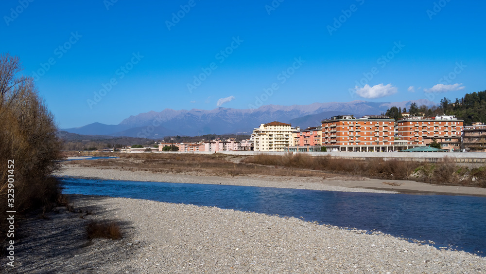 View of Aulla, in Lunigiana, north Tuscany, Italy. With Magra River and mountains behind. Photo taken 2020 hence flood defences visible