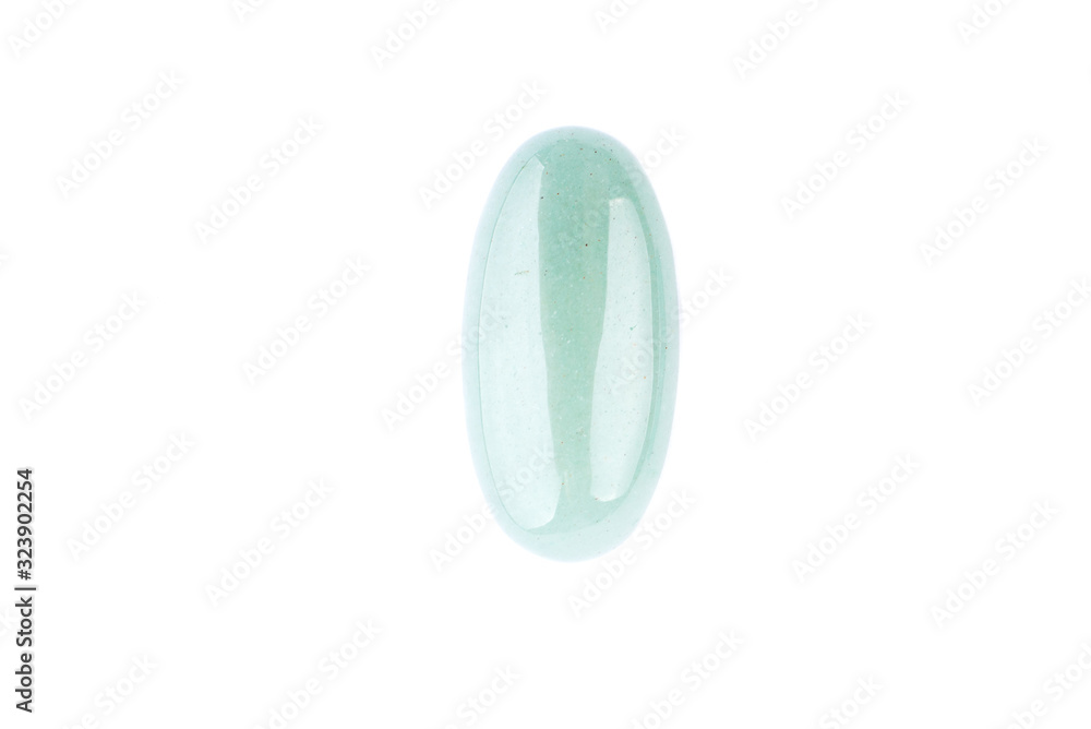 Blue cabochon stone on a white background, costume jewelry Blue cabochon stone on a white background, costume jewelry