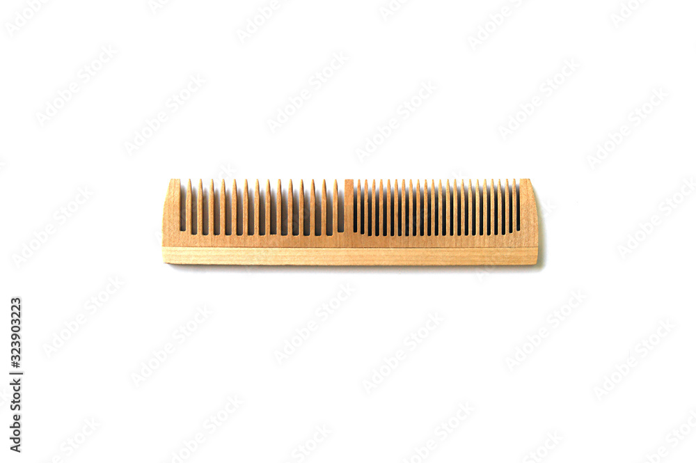 Single wood comb isolated on white background.