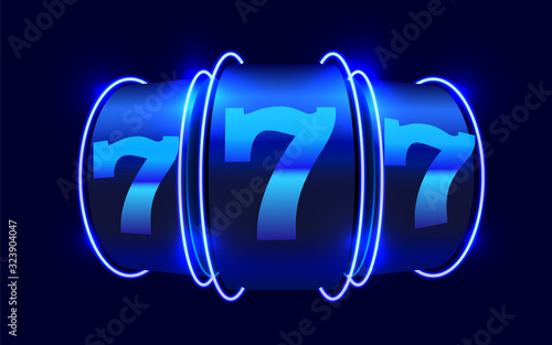 Neon slot machine wins the jackpot. 777 Big win casino concept.