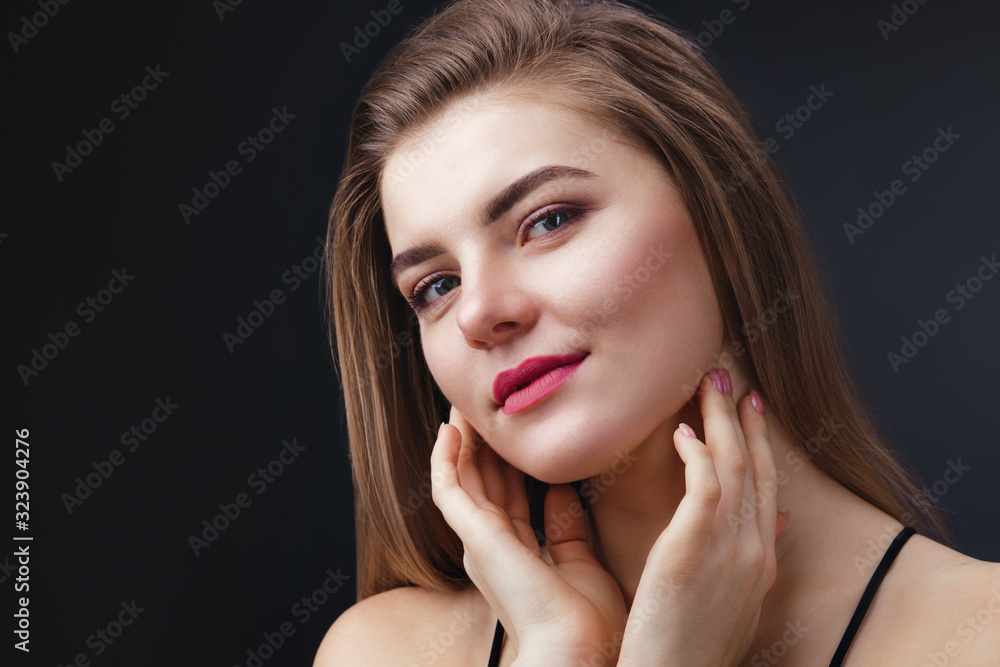 Fototapeta premium Closeup portrait of beautiful lady with natural makeup and smooth healthy skin