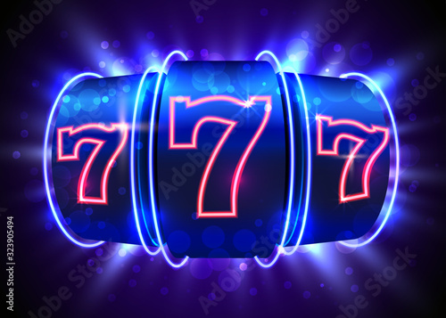 Neon slot machine wins the jackpot. 777 Big win casino concept.