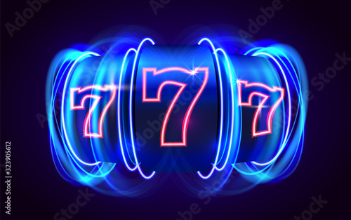 Neon slot machine wins the jackpot. 777 Big win casino concept.