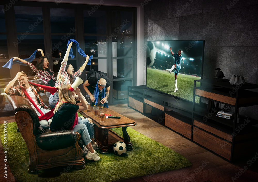 Group of friends watching TV, match, championship, sport games. Emotional men and women cheering for favourite football team, look on fighting for ball. Concept of friendship, competition, emotions.