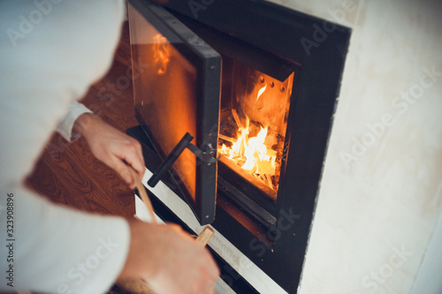 Home fireplace in winter evening warms