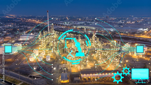 Aerial view of chemical oil refinery plant, power plant at sunset sky for industry and maintenance concept.