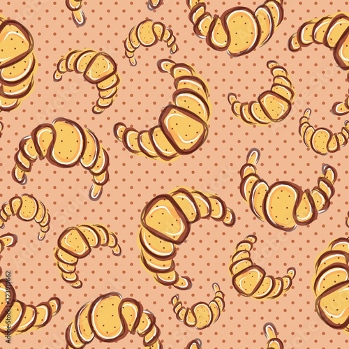 seamless pattern of tasty croissants with poppy seeds on a background with dots