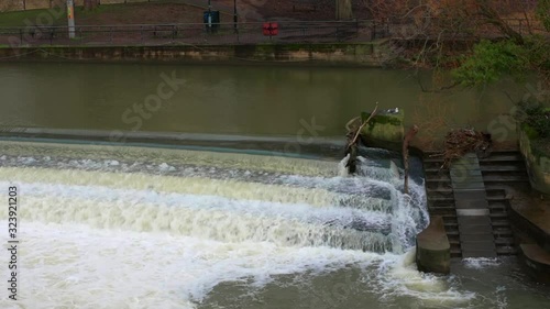 Wallpaper Mural Aspect of a large river weir at the Pulteney Bridge on the River Avon, in the beautiful Roman city of Bath, in the English West Country Torontodigital.ca