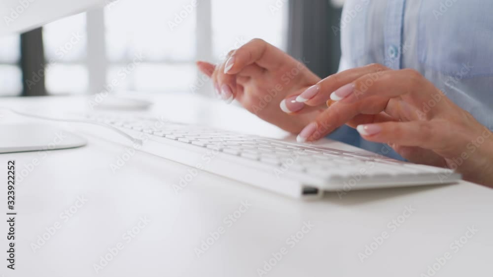 Female hands typing on a computer keyboard. Concept of remote work. Female hands typing on a computer keyboard. Concept of remote work.