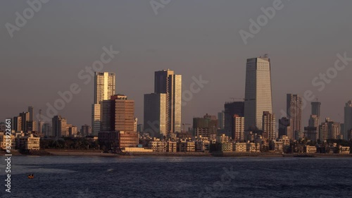 Timelapse of large modern seafacing office building Mumbai photo