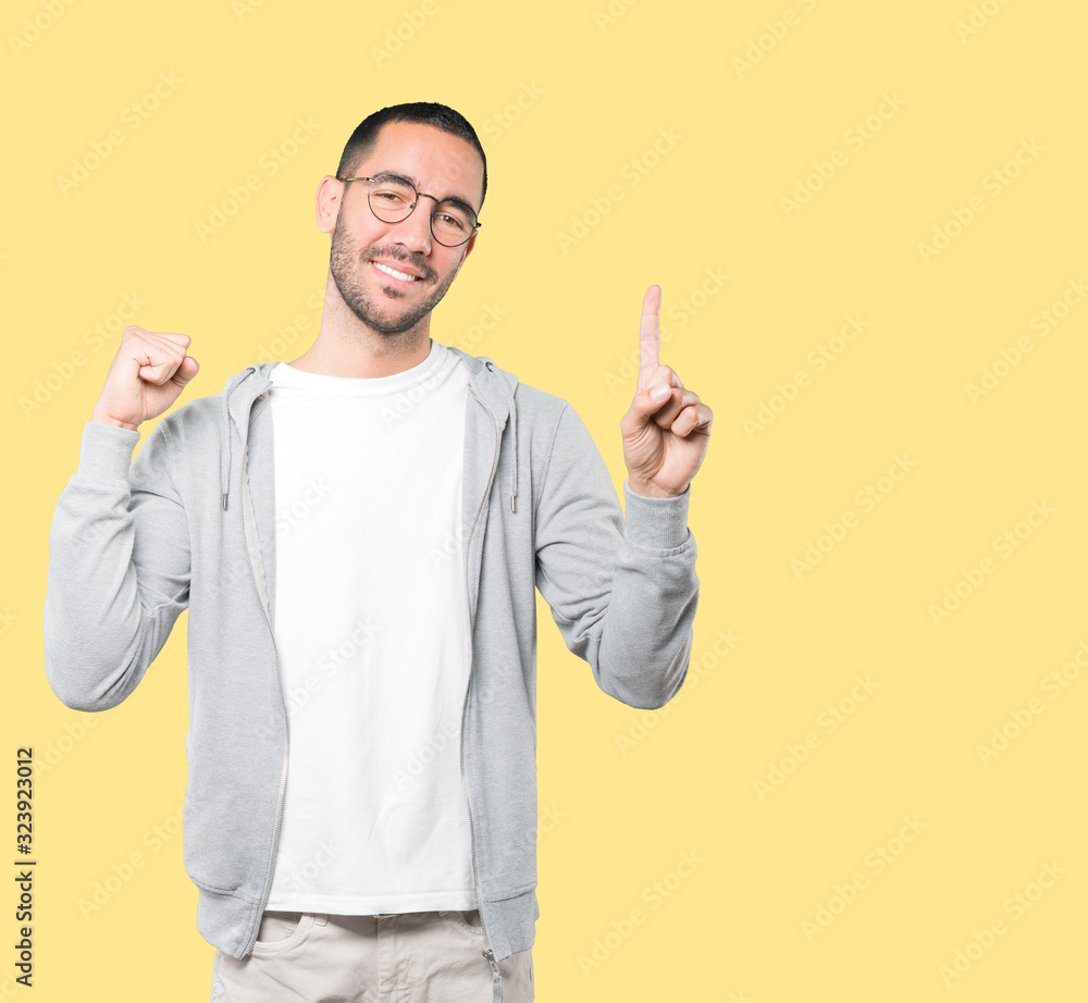 Young man making a number one gesture Young man making a number one gesture