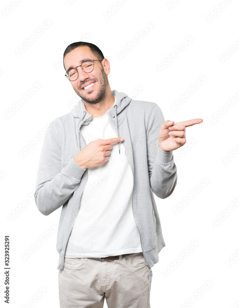 Naughty young man laughing at you Naughty young man laughing at you