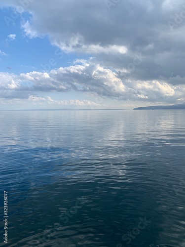 Sky reflection on the surface of the sea, natural colors