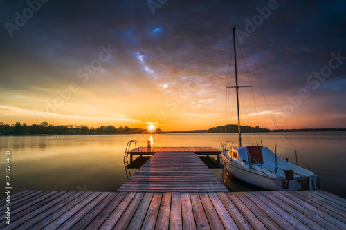 Fototapeta Naklejka Na Ścianę i Meble -  Sunset on the Wulpińskie lake near Olsztyn in Poland
