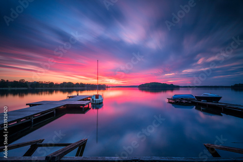 Fototapeta Naklejka Na Ścianę i Meble -  Sunset on the Wulpińskie lake near Olsztyn in Poland
