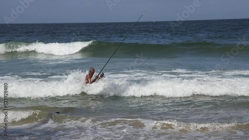 Fishing at an epic northcoast location at Yarra Beach on the Caribbean island of Trinidad photo