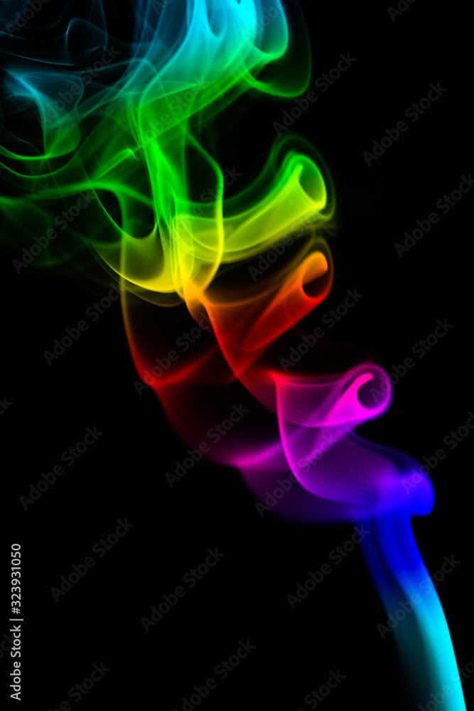Obraz premium Colored smoke on black background