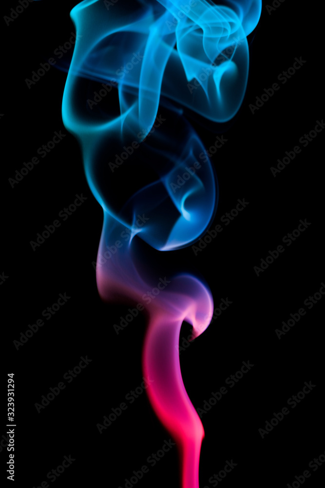 Obraz premium Colored smoke on black background