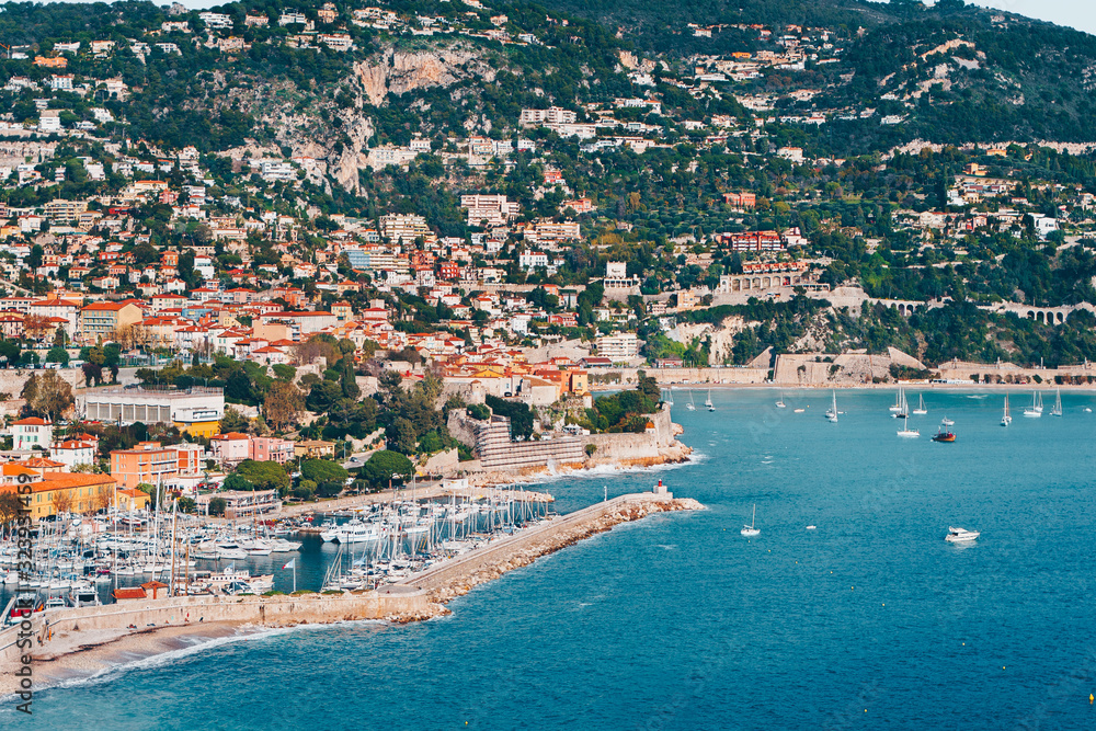 Landscape of harbor, port in Nice. Cote d'Azur France. Luxury resort of French riviera. scenery panoramic aerial cityscape view of Nice, France. azure water, harbor, apartments, yachts and sailboats.
