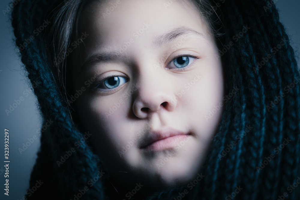 Beautiful girl with snub dressed on her head from cold. Beautiful girl with snub dressed on her head from cold.