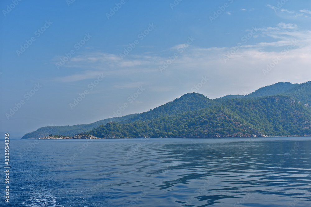 blue water, blue sky, mountains. aegean. Turkey blue water, blue sky, mountains. aegean. Turkey