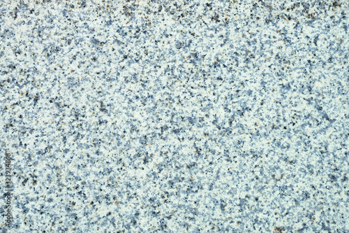 Light gray polished granite texture. Stone background