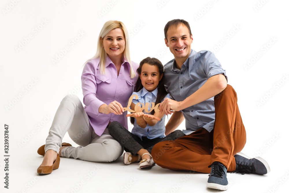 Close up photo of cheerful lovely three people isolated over white background. Close up photo of cheerful lovely three people isolated over white background.