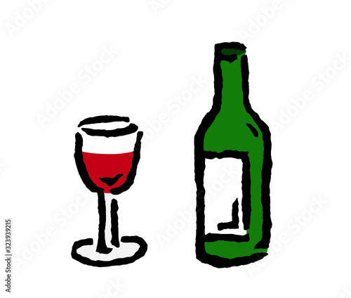 Rotwein im Glas und Weinflasche