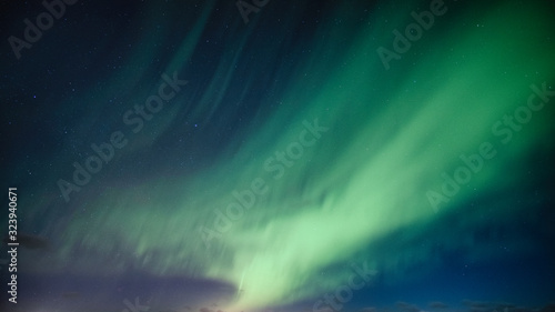 Aurora Borealis, Northern Lights with star on arctic circle