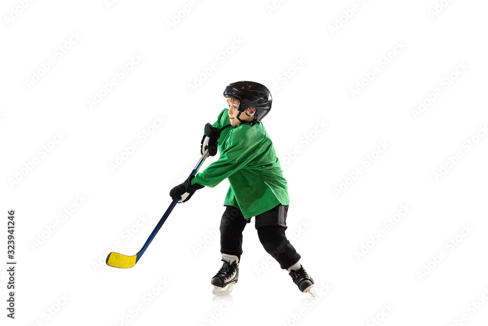 Little hockey player with the stick on ice court, white studio background. Sportsboy wearing equipment and helmet, practicing, training. Concept of sport, healthy lifestyle, motion, movement, action. Little hockey player with the stick on ice court, white studio background. Sportsboy wearing equipment and helmet, practicing, training. Concept of sport, healthy lifestyle, motion, movement, action.