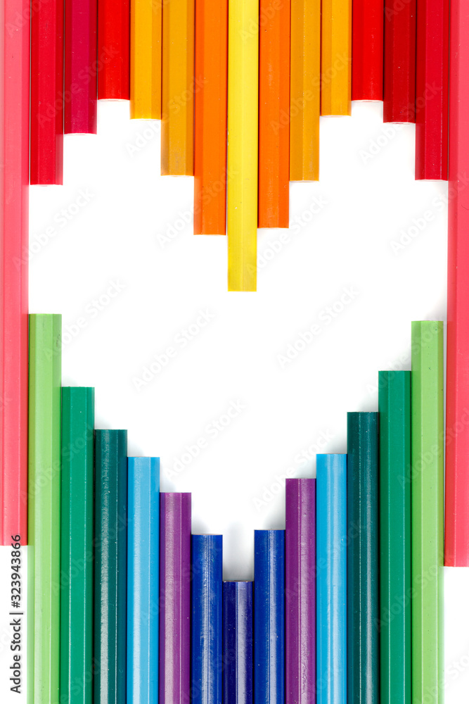 Obraz premium Multicolored pencils in the form of a heart
