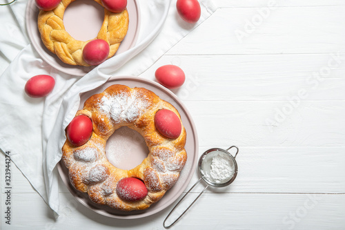 Tasty easter bread. Easter bread and red eggs. Italian easter bread