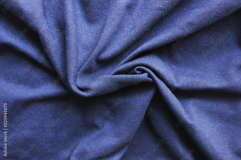 Crumpled dark blue cloth texture background. Wrinkled fabric material, close up top view of wavy natural cloth material surface. Creasy blue fabric, simple textile of one color Crumpled dark blue cloth texture background. Wrinkled fabric material, close up top view of wavy natural cloth material surface. Creasy blue fabric, simple textile of one color