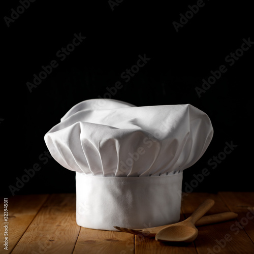 Cook hat on dark background and free space for your decoration. 