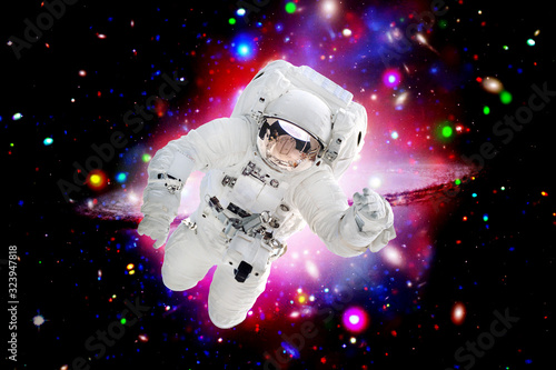 Fototapeta Naklejka Na Ścianę i Meble -  Astronaut in space. The elements of this image furnished by NASA.
