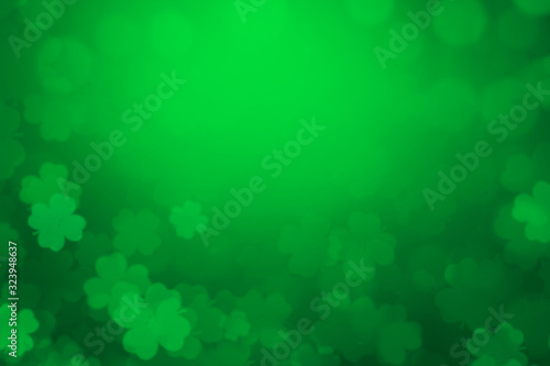ST Patrick's day background green clover leaf bokeh lights defocused for ST Patrick's day celebration design background