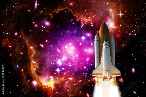 Rocket in the deep space. Galaxy and stars. The elements of this image furnished by NASA.