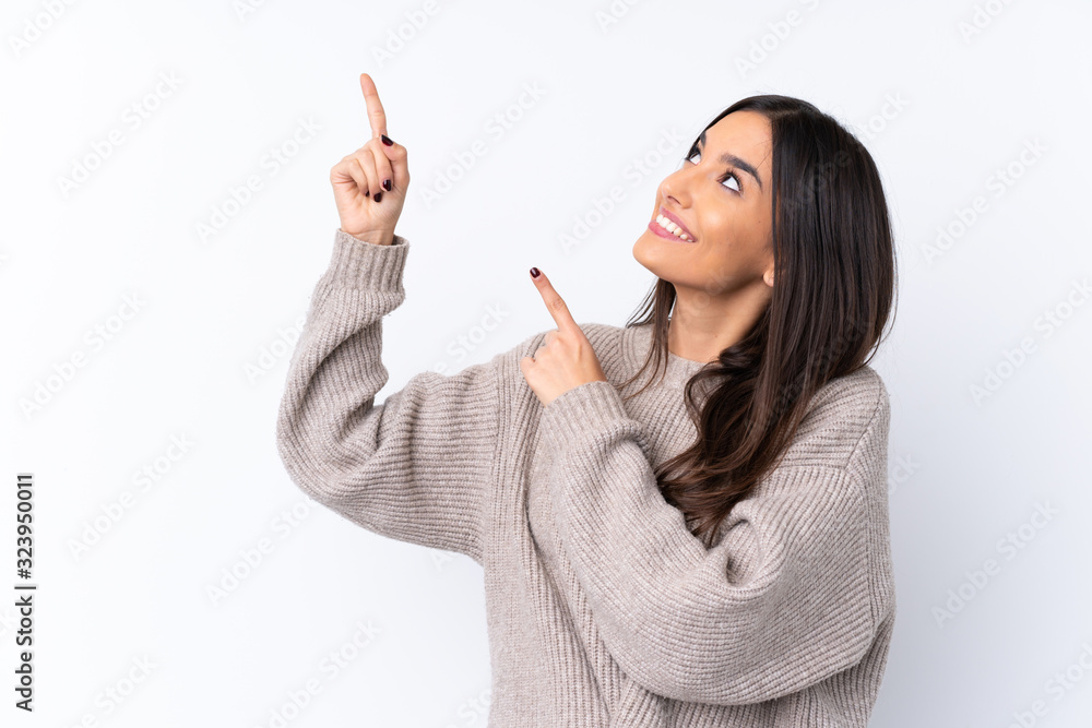 Young brunette woman over isolated white background pointing with the index finger a great idea Young brunette woman over isolated white background pointing with the index finger a great idea