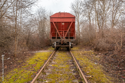 Back view of grain hopper on the railway © graja