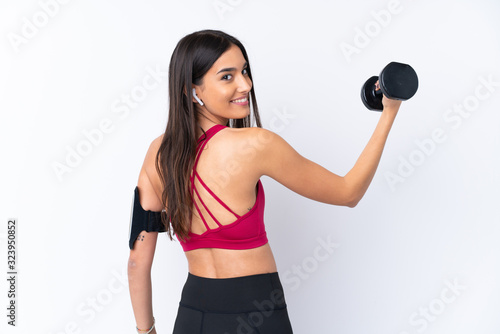 Young sport brunette woman over isolated white background making weightlifting
